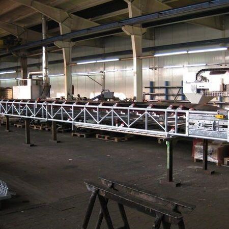 Plastic belt conveyor in dog food manufacturing